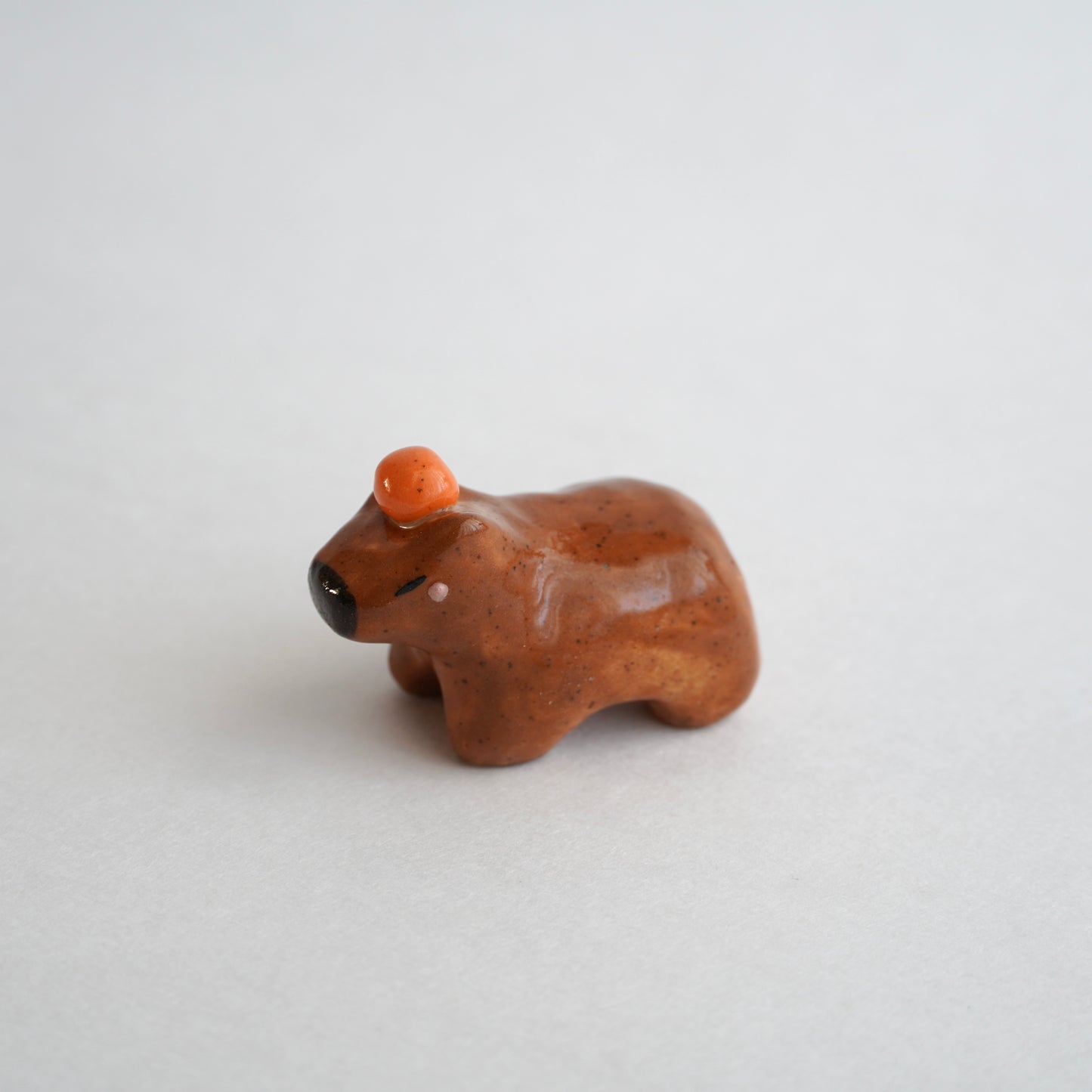 capybara with orange