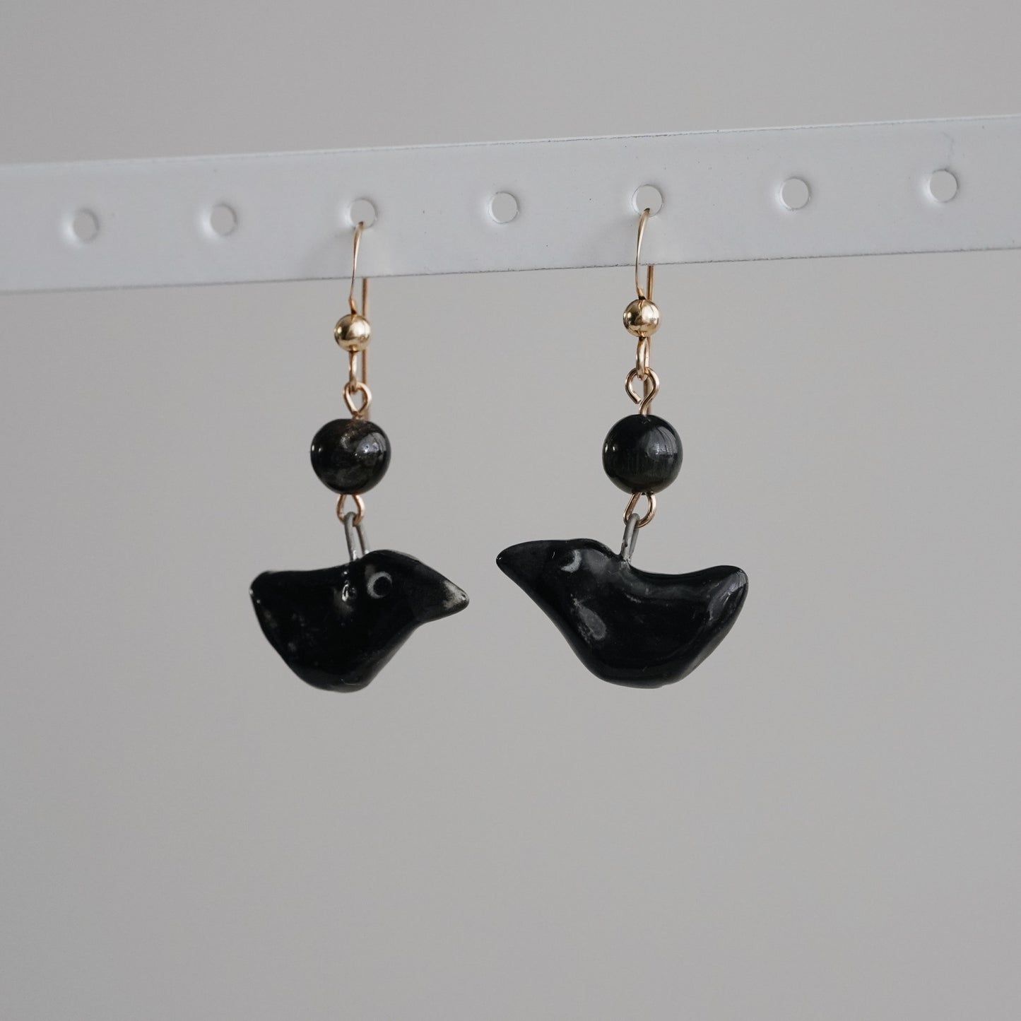 crow dangle earrings